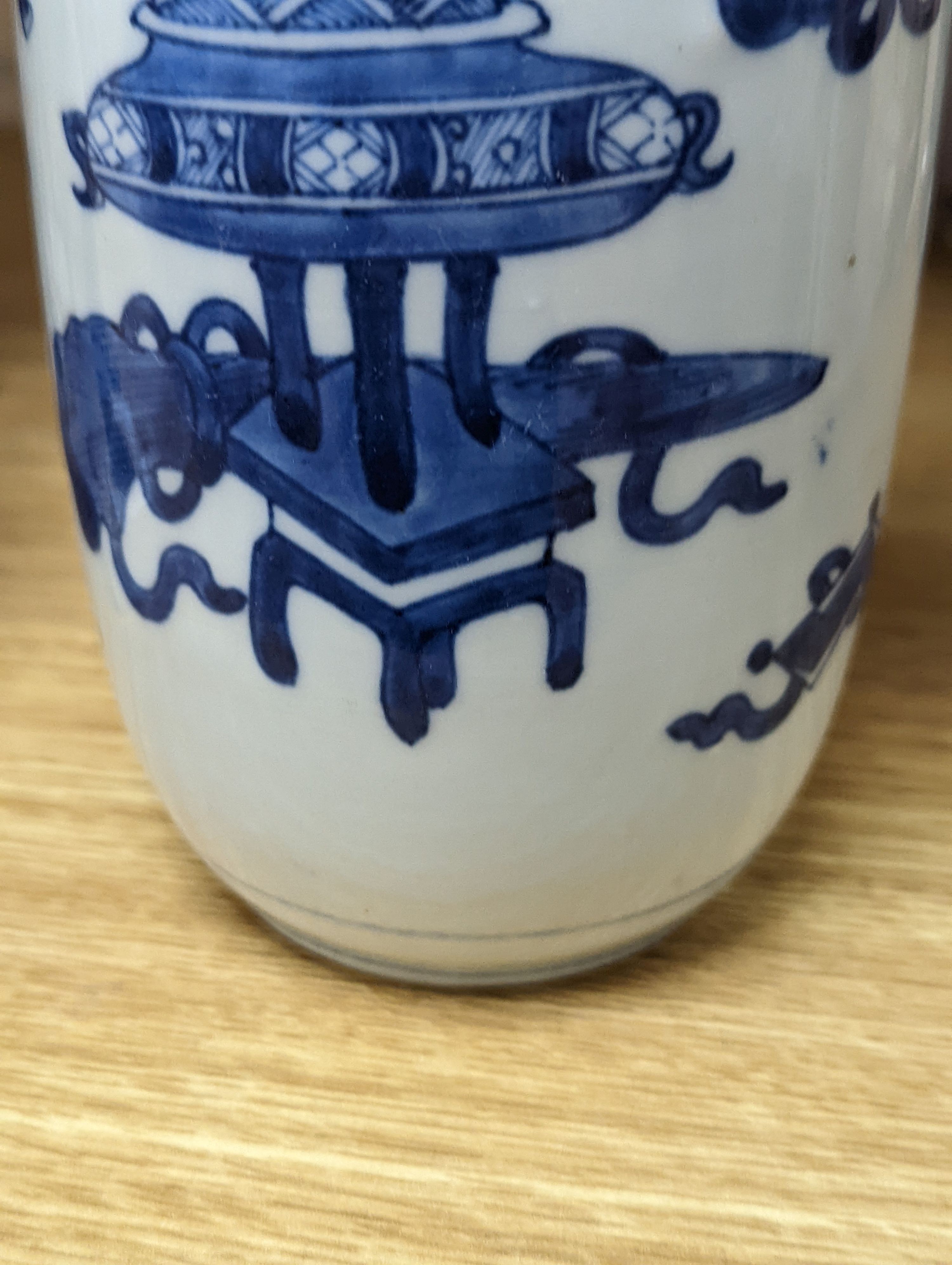 A Chinese blue and white ‘Antiques’ vase, 19.5 cms high.